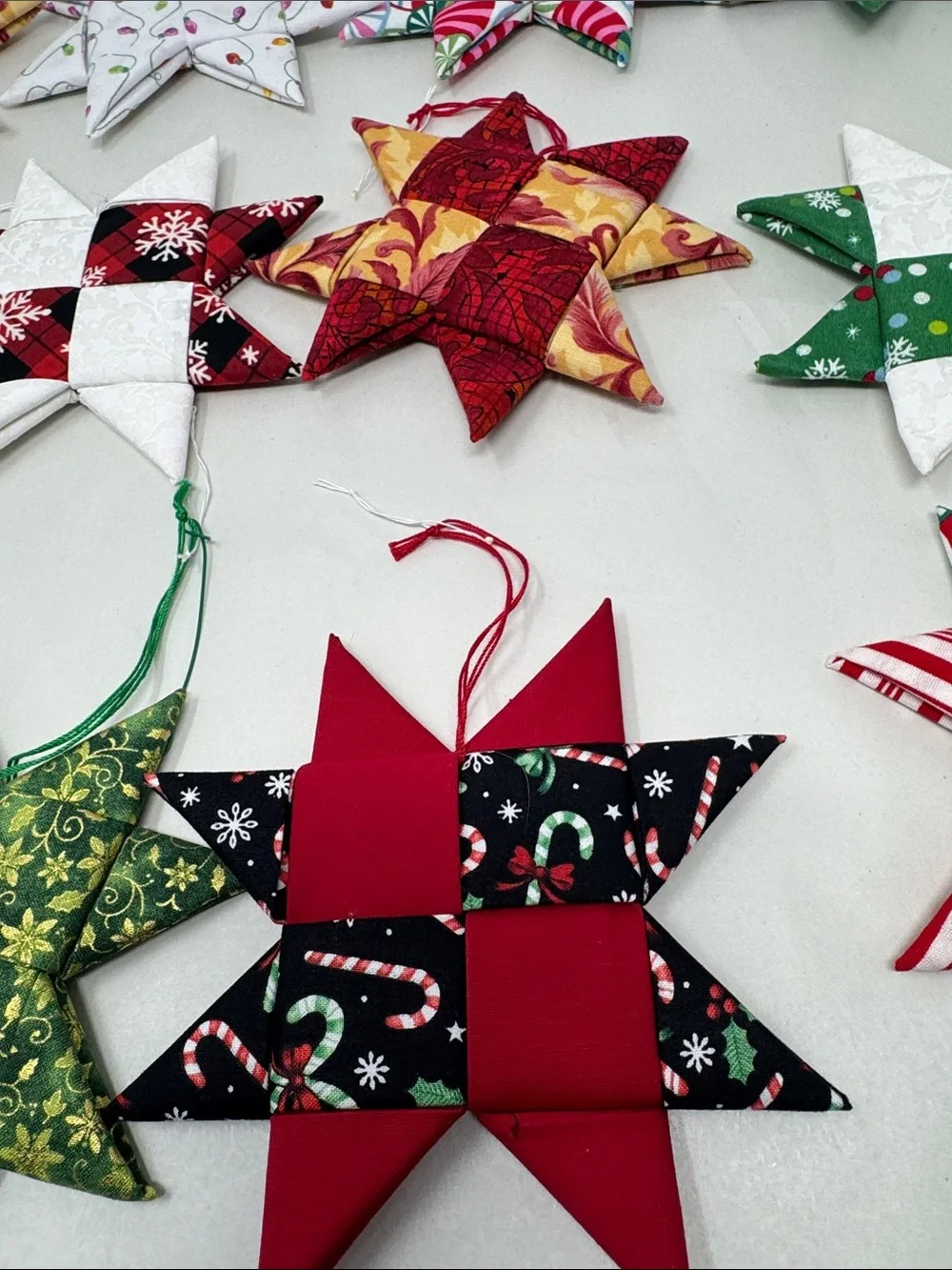 HANDMADE FOLDED FABRIC FOLDED STARS CHRISTMAS ORNAMENTS QUILT LOT OF 11 BOHO